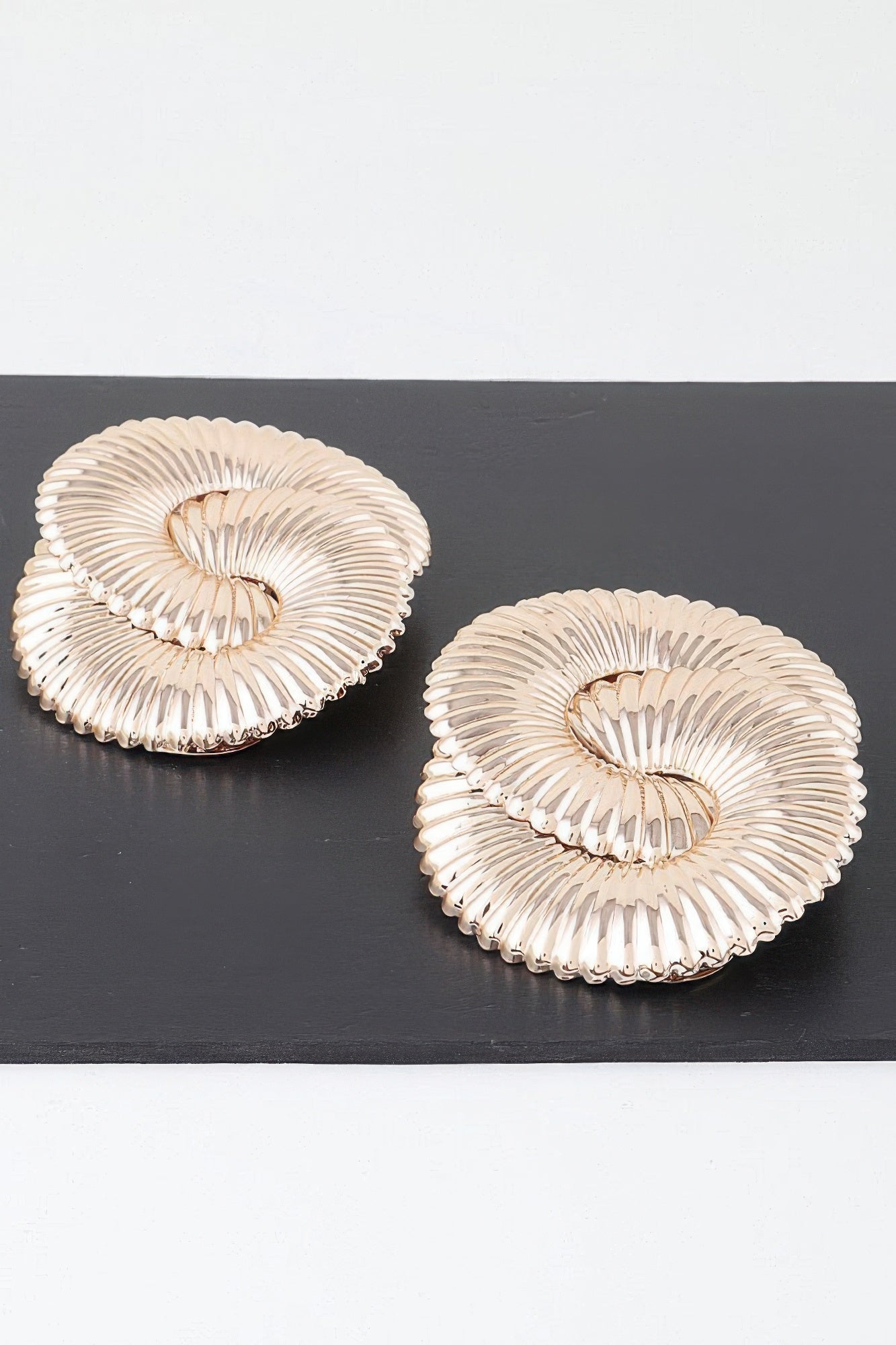 Gold Interwoven Loop Statement Earrings Secondary image