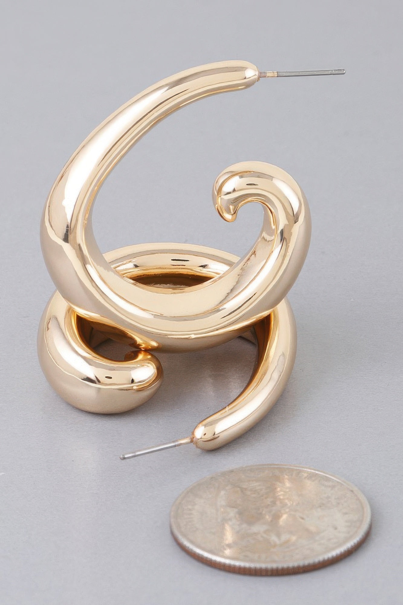 Gold Sculpted Wave Hoop Earrings Secondary image