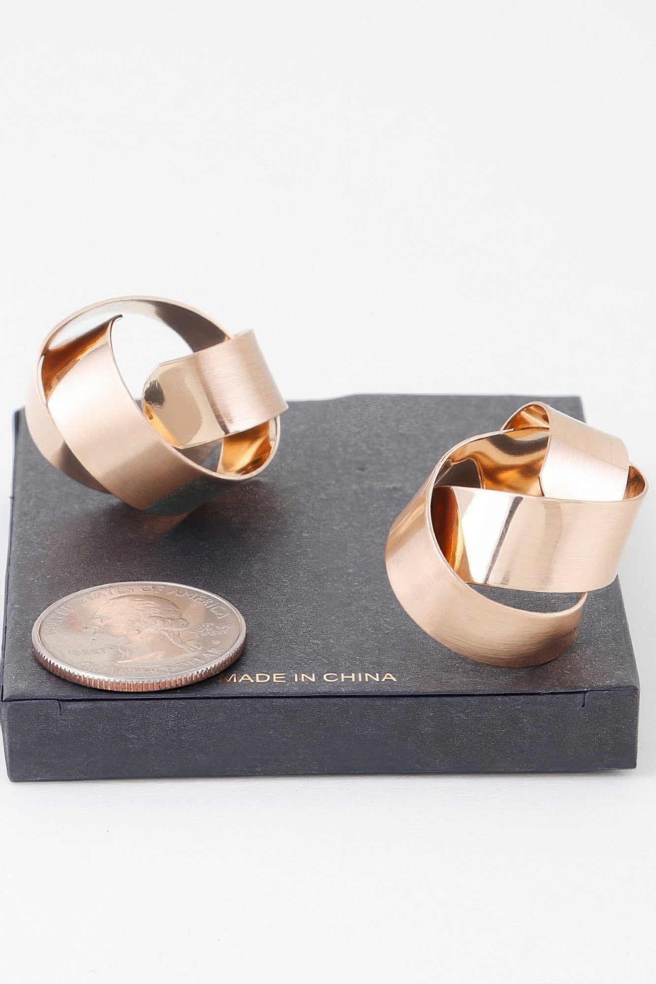 Gold Curved Hoop Earrings With Polished Shine Secondary image