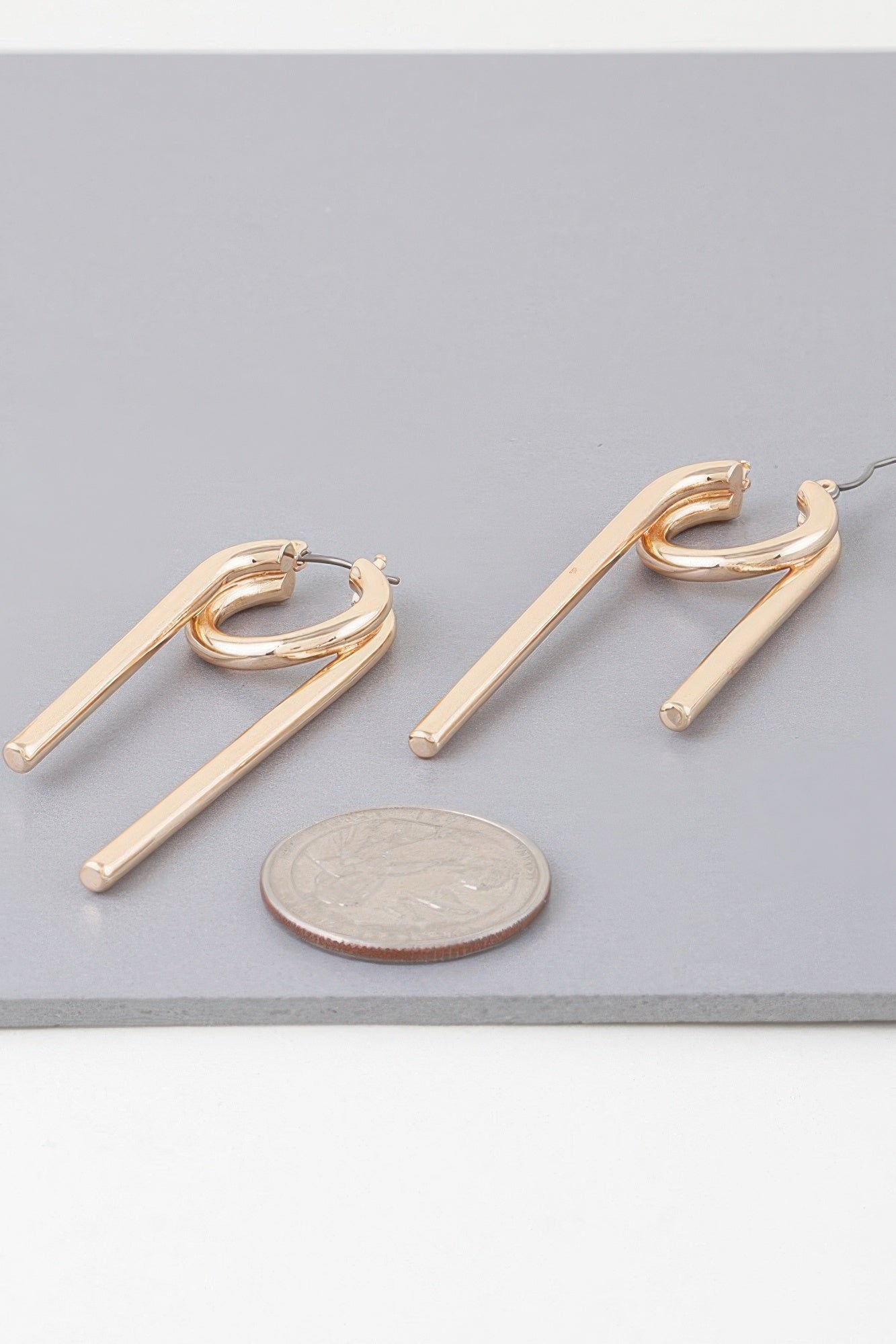 Gold Sculptural Drop Earrings Secondary image