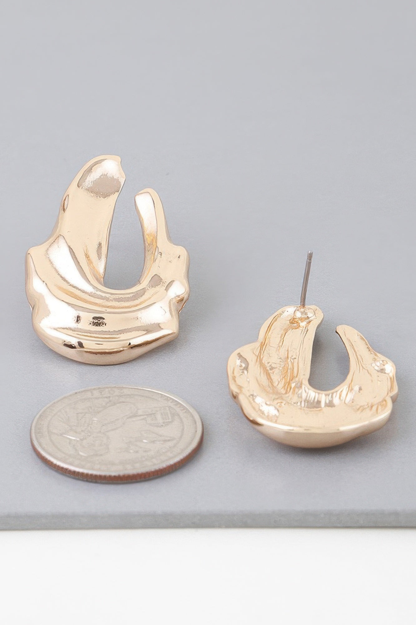 Gold Ripple Drop Earrings Secondary image
