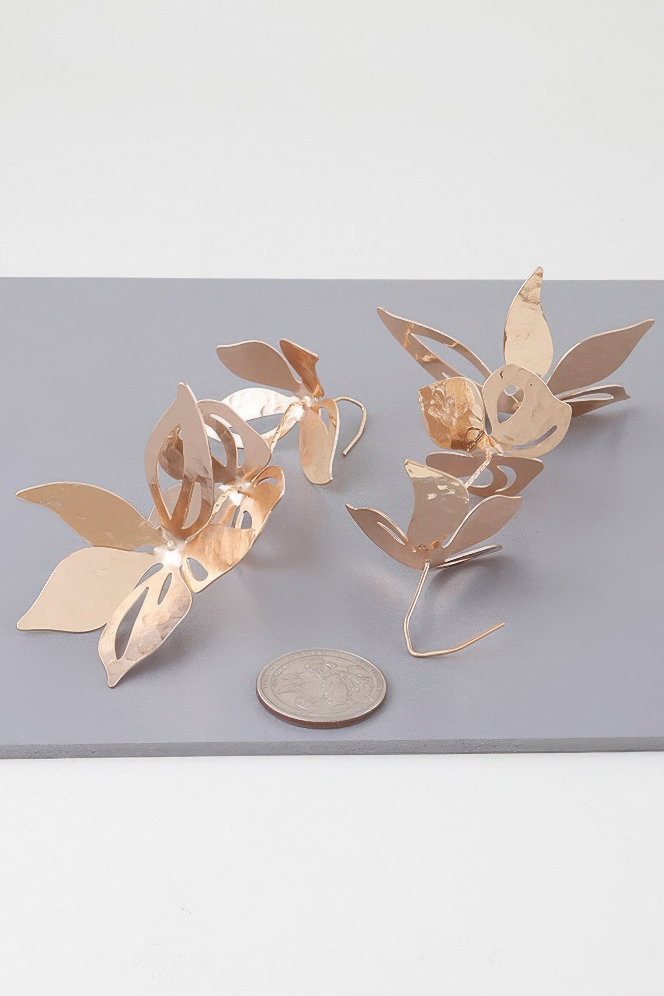 Gold Triple Flower Cascade Drop Earrings Secondary image