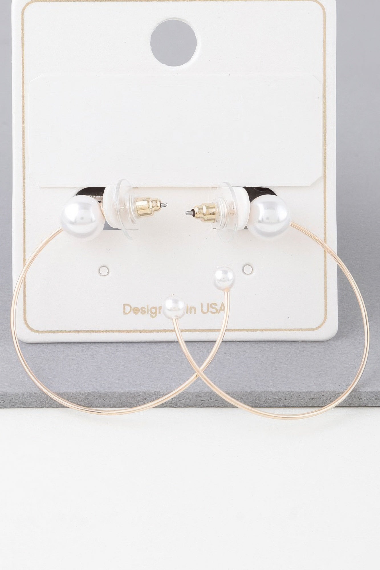 Gold Hoop Earrings with Cream Pearl Accents Secondary image