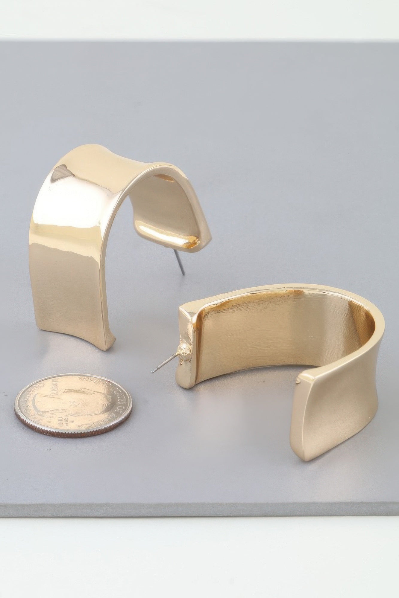 Gold Polished Rectangular Statement Earrings Secondary image