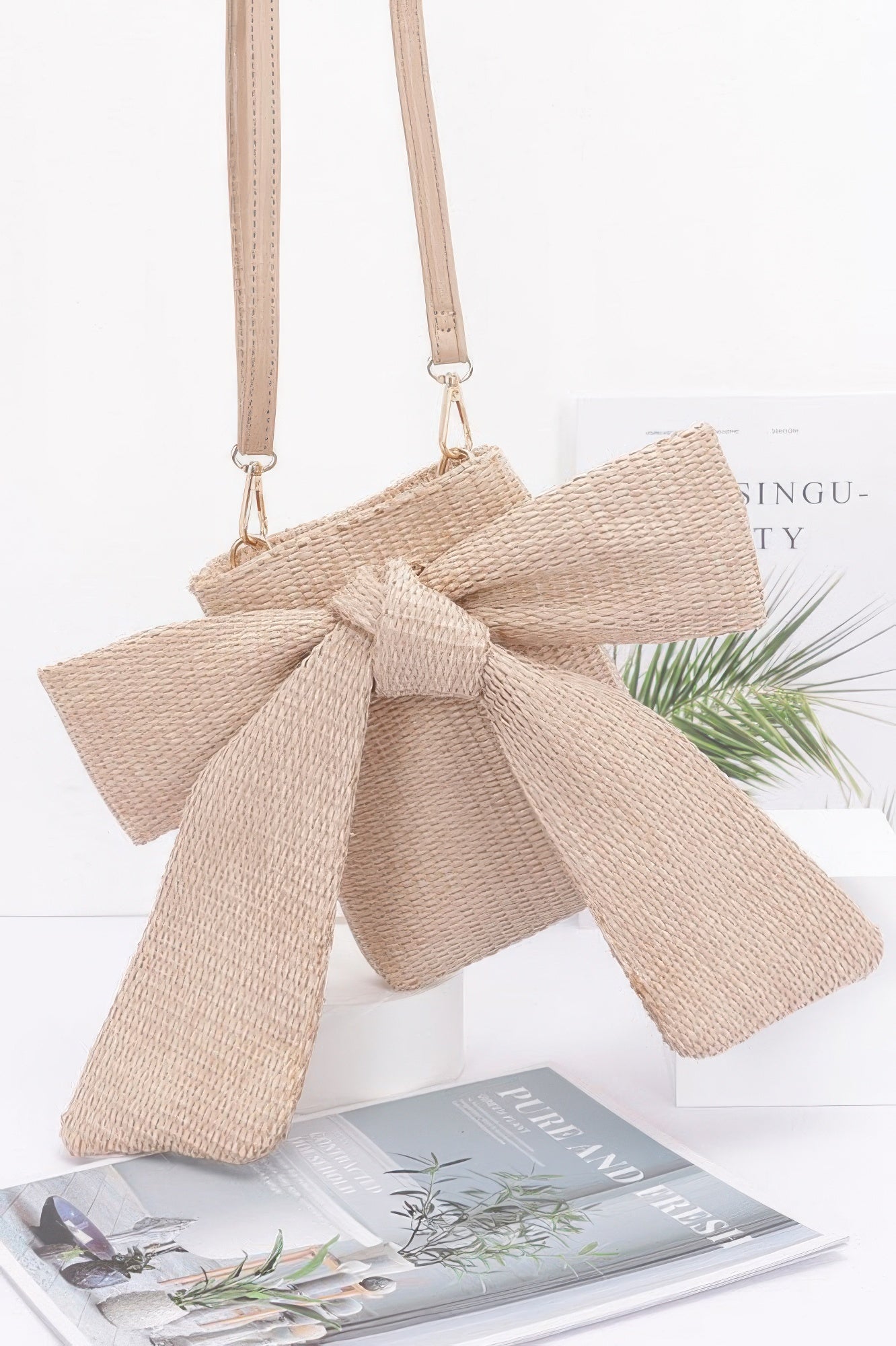 Woven Bow Clutch With Shoulder Strap Secondary image