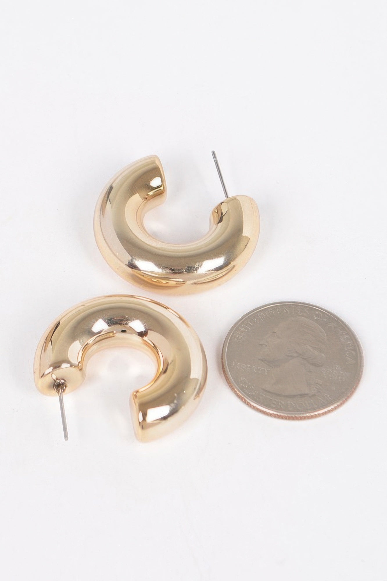 Curved Hoop Earrings with Dual-Tone Metal Finish Secondary image