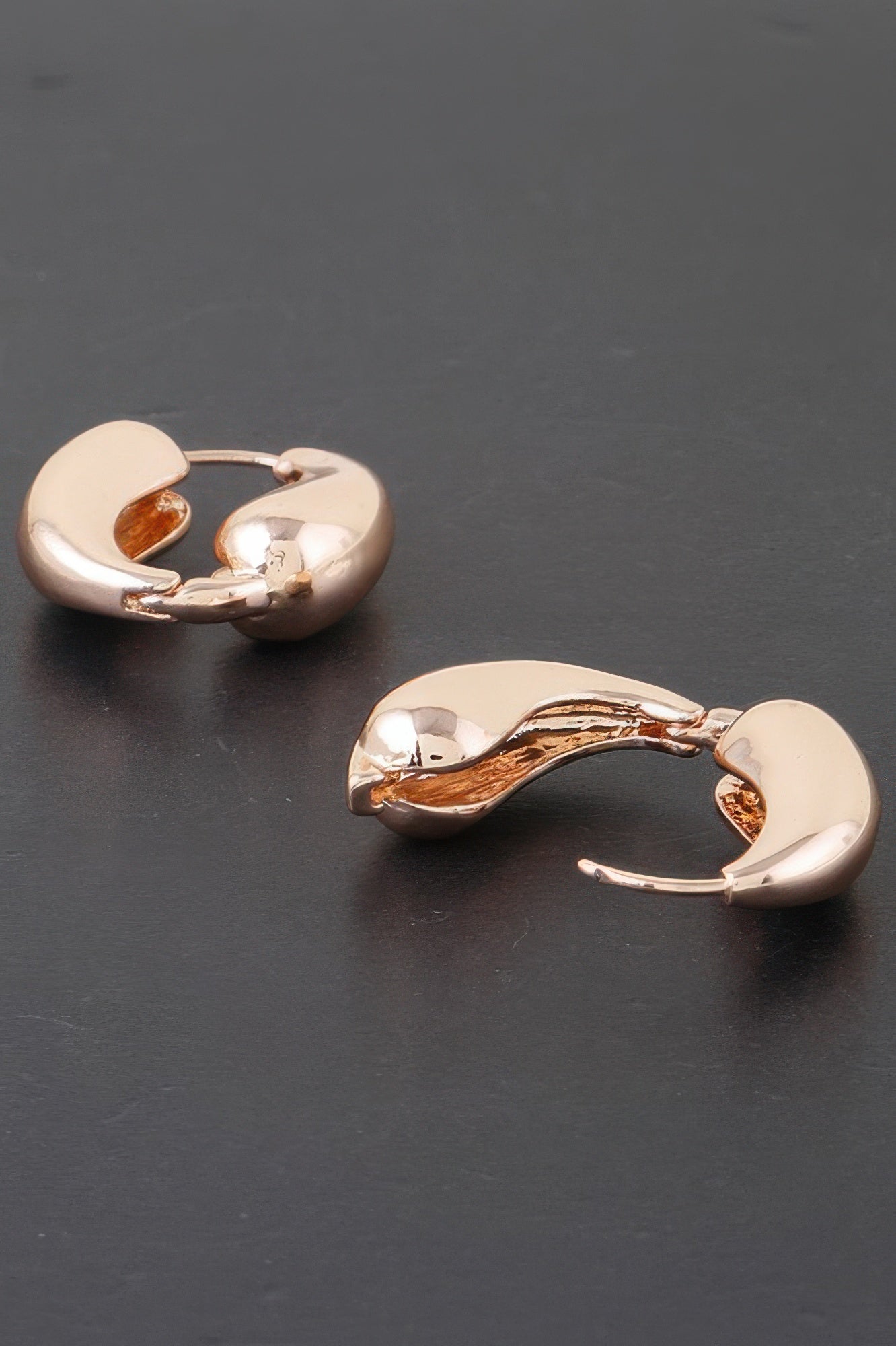 Yin-Yang Inspired Polished Hoop Earrings Secondary image