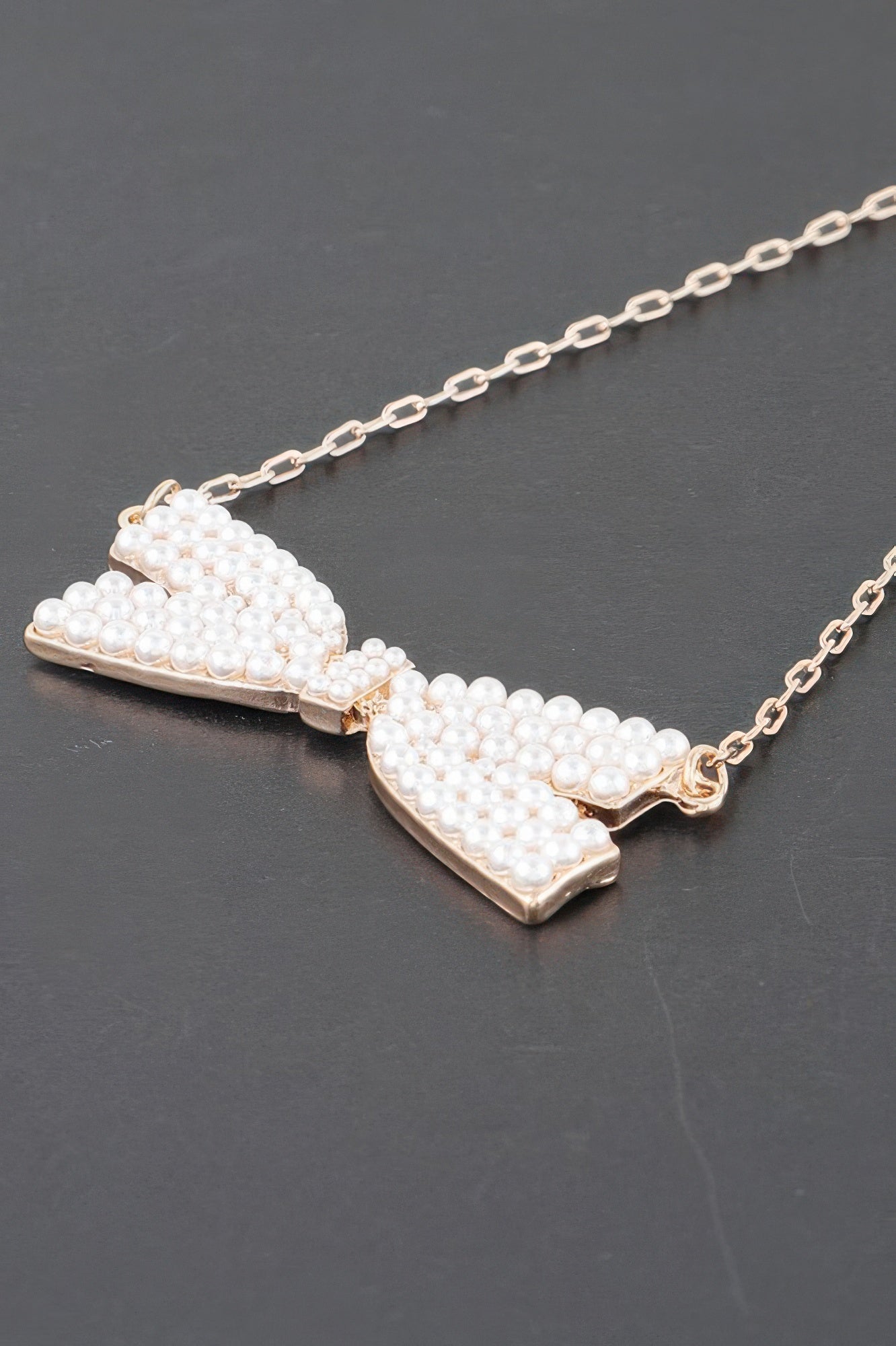 Gold Cream Faux Pearl Bow Pendant Necklace Secondary image
