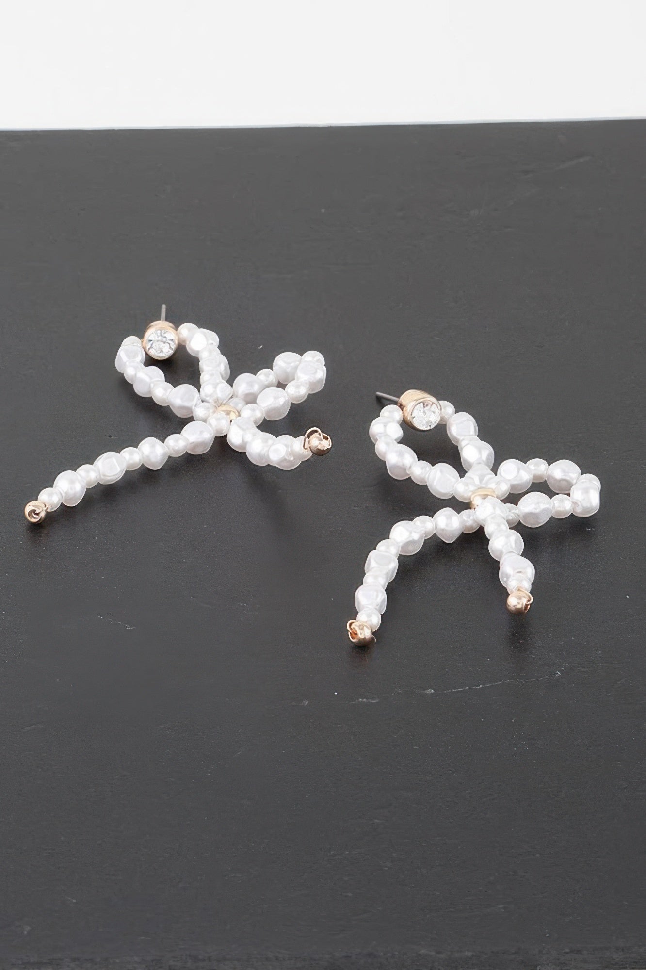 Gold Cream Pearl and Ribbon Loop Earrings Secondary image