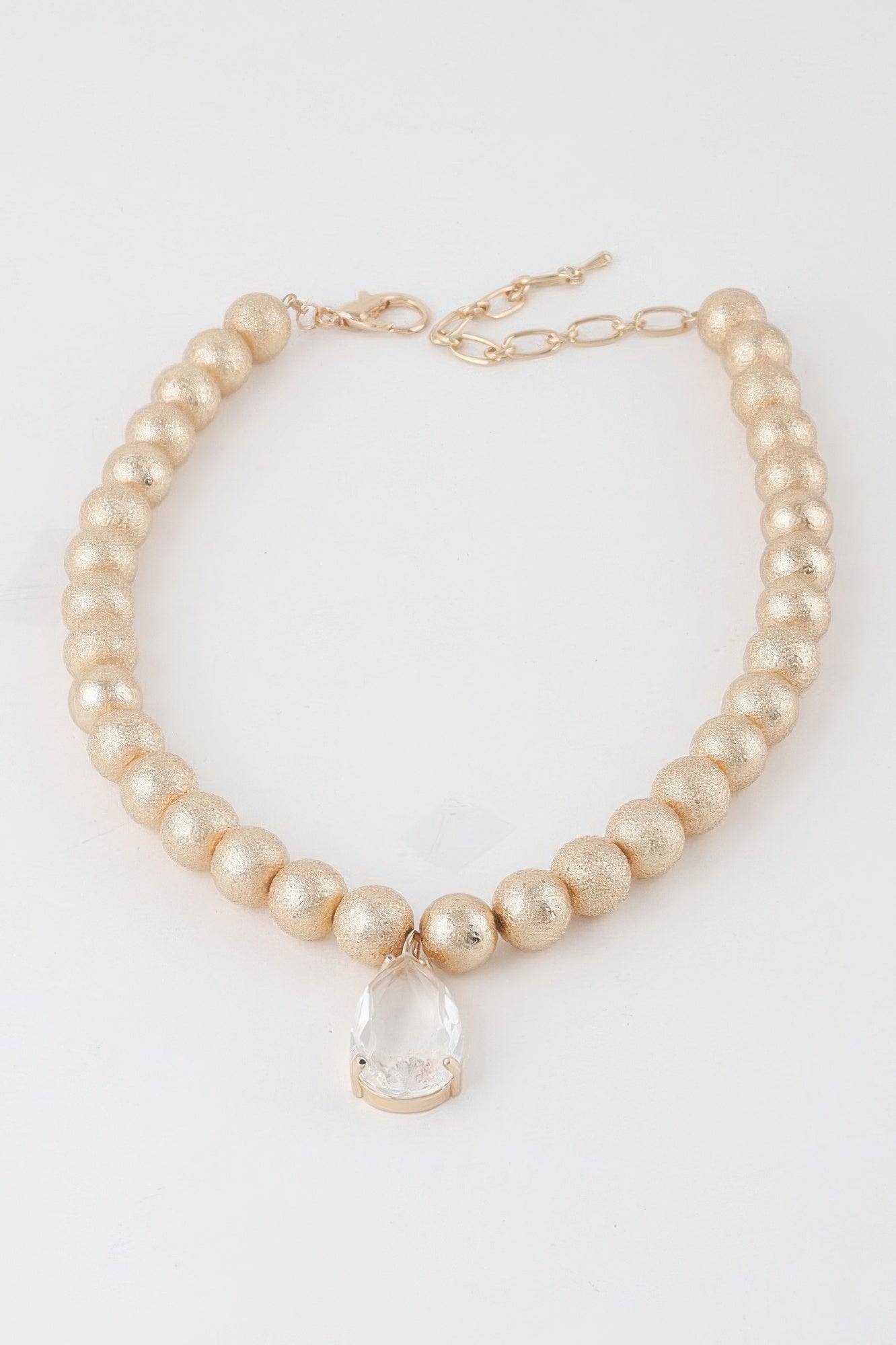 Gold Beaded Necklace with Clear Teardrop Pendant Secondary image