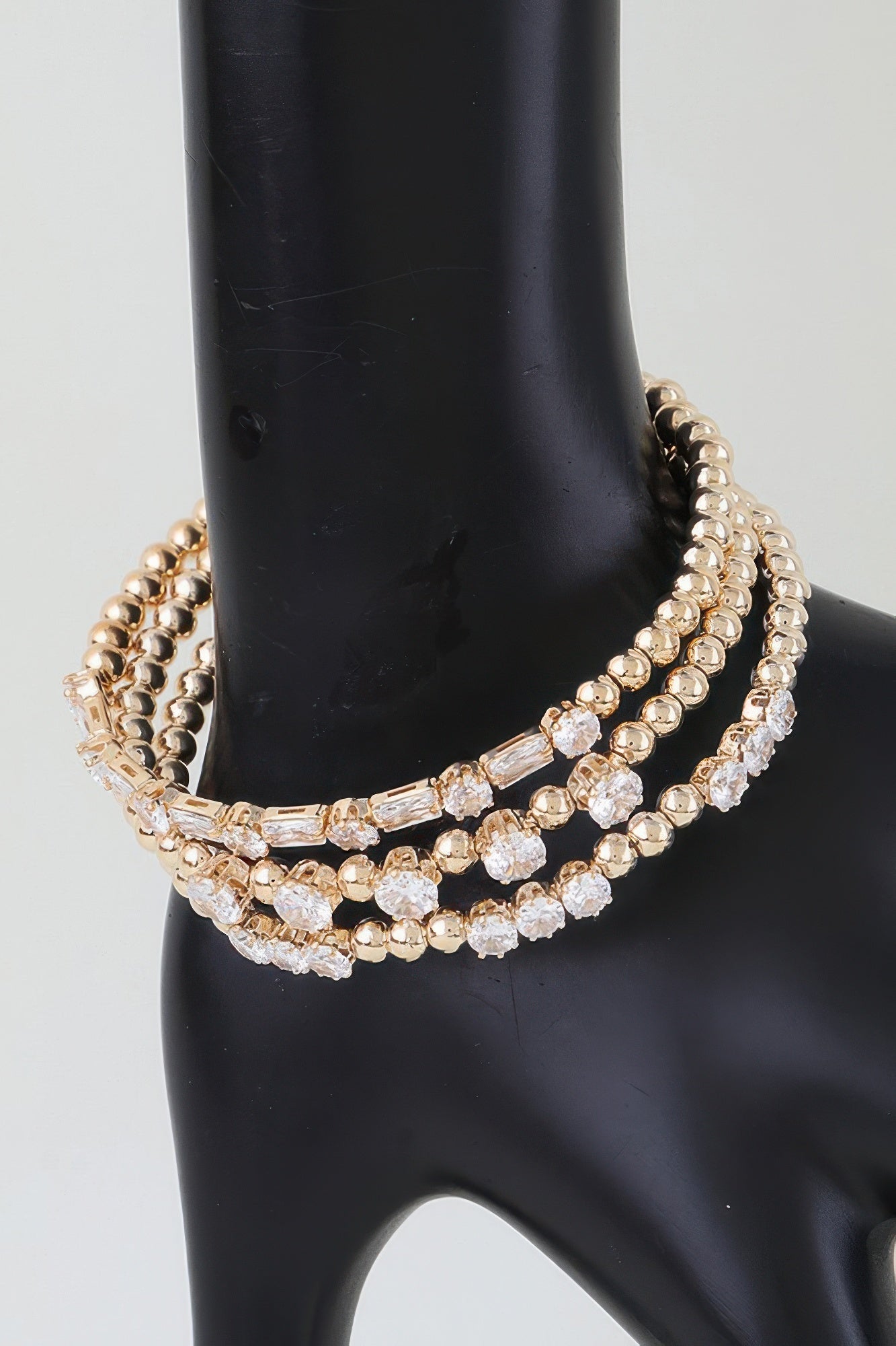 Gold Beaded Bracelet with Layered Rhinestone Strands Secondary image